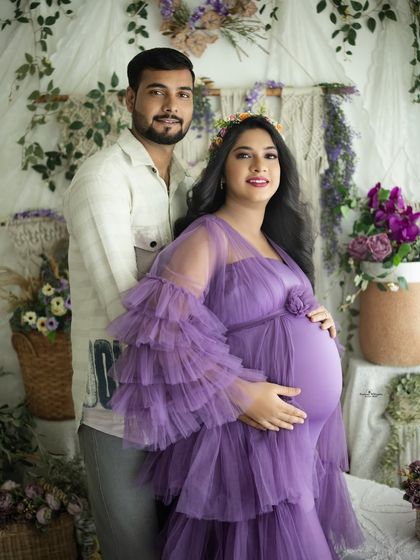 A sweet couple's portrait in our earthy boho setting. The lavender gown adds a beautiful pop of color against the natural textures of the backdrop.
