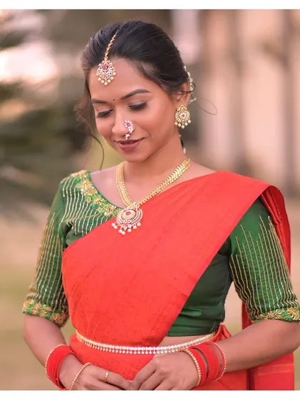 Leenal, looking radiant as ever on her engagement day. The look is simple, elegant, and timeless.