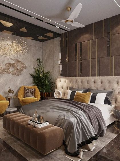 This master bedroom design is a masterpiece of texture and mood. We used dark, dramatic wall paneling with brass inlays, a tufted wingback headboard, and vibrant yellow accent chairs to create a space that feels opulent, bold, and full of character.