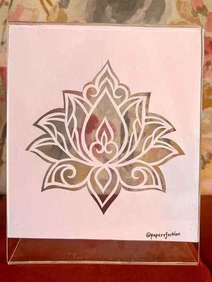 Here is my finished lotus design, all framed and ready to go. I chose a clear acrylic frame for this one because it gives the paper-cut a beautiful floating effect. The lotus is such a peaceful and symmetrical symbol to work on.