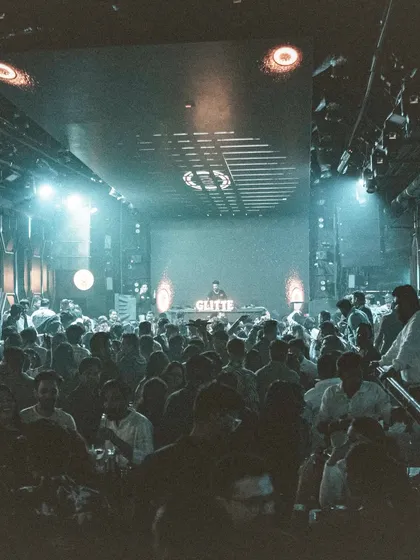 A view from the DJ booth at Glitte, looking out over a completely packed club. This is the energy that fuels my performance.