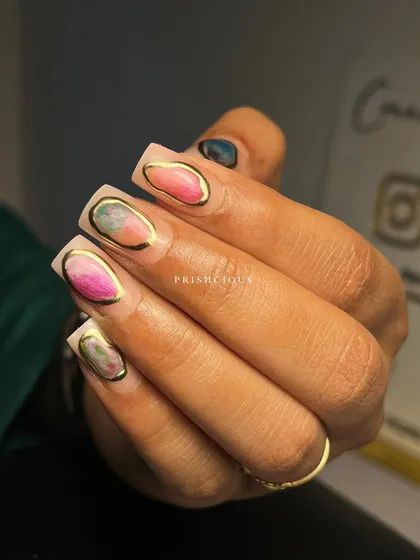 This gemstone effect is an obsession. I created this look with a watercolor technique using different colors, all framed by a 3D gold chrome border to look like a real gem.