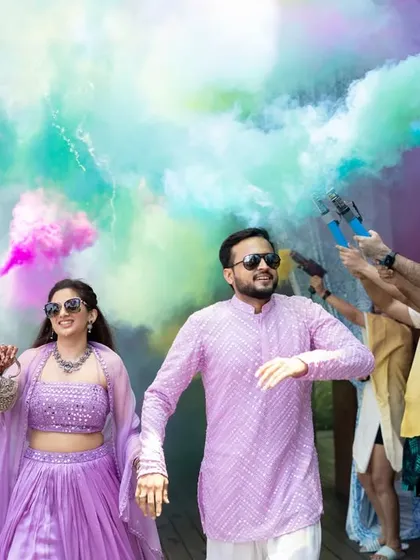 Let's make a splash! We choreograph vibrant and fun entries for any event, like this incredible pool party entrance complete with colorful smoke bombs to get the party started.