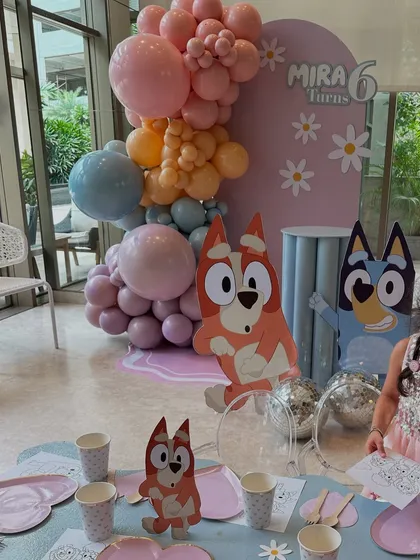 A view of the Bluey backdrop from the kids' activity table, showing how the theme was integrated into every part of the celebration.