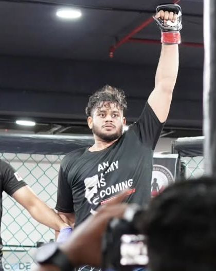 Victory. Tarun Hiremath gets his hand raised after a first-round referee stoppage. A decisive win for our team.