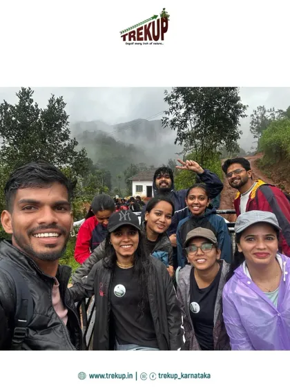 A selfie of our trekking group on the back of a jeep, all smiles as they head towards the trail.