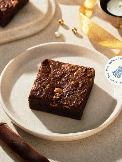 A classic with a twist, my Chocolate Hazelnut Brownie combines rich chocolate with the delightful crunch of roasted hazelnuts. It's a sophisticated choice for any festive dessert platter.