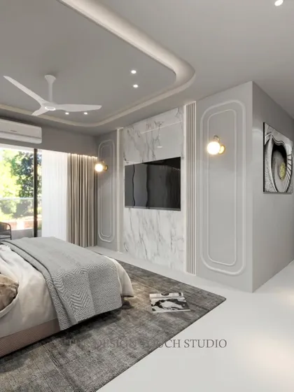 Another view of the TV wall, emphasizing the clean lines and the luxurious feel of the marble panel.