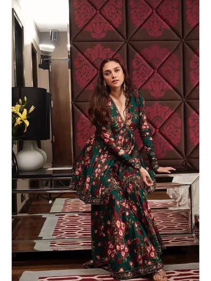 A full-length view of the Prints by Radhika floral set, showing the flattering silhouette and rich, jewel-toned colors.