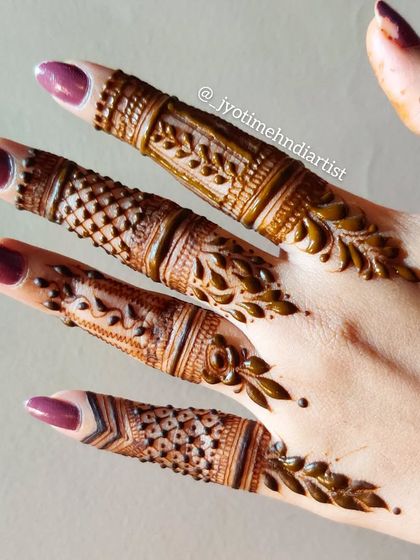 Another angle of the detailed finger designs, showing the fine lines and delicate shading.