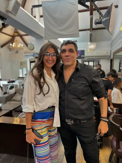 The smiles say it all. Here I am with a happy client after her appointment. My goal is simple: I want you to leave our salon feeling happier and more confident than when you walked in.