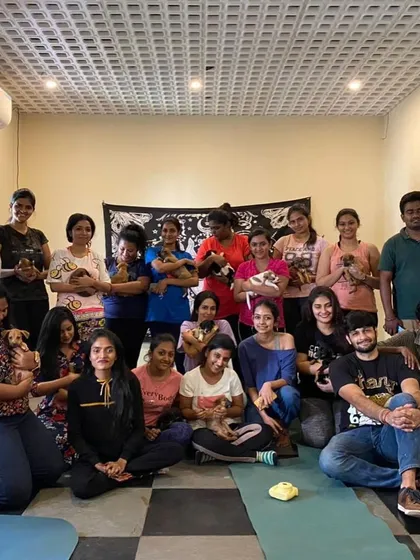 A group photo from our Art with Shelter Puppies event at Soundtrack Cafe in Pune. So many happy faces, both human and canine.