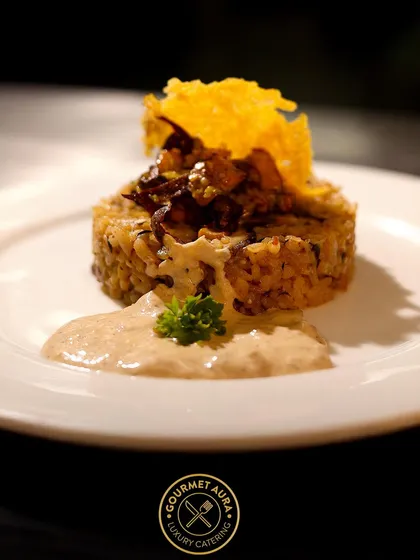 Another view of our expertly plated mushroom risotto, highlighting the creamy texture and rich toppings. A true culinary masterpiece.