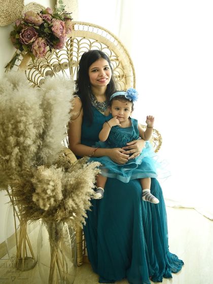 A mother and daughter portrait in my studio's boho corner. The peacock chair and pampas grass add a stylish and modern touch to this beautiful "Mumma and me" photo.