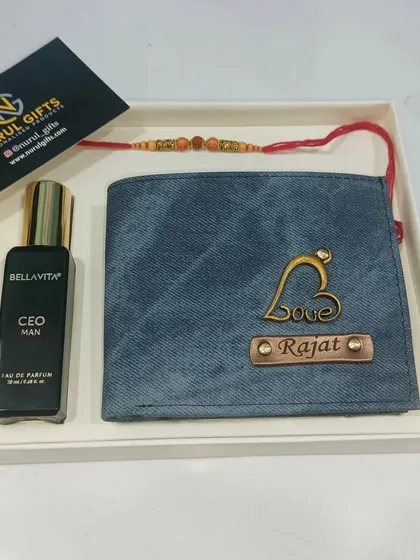 A special Raksha Bandhan combo featuring a personalized denim wallet, a custom rakhi, and a bottle of Bella Vita CEO perfume.