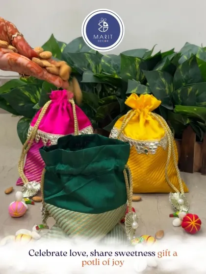 Celebrate love, share sweetness. These beautiful, vibrant 'potlis' filled with dry fruits are a potli of joy, perfect for any celebration.
