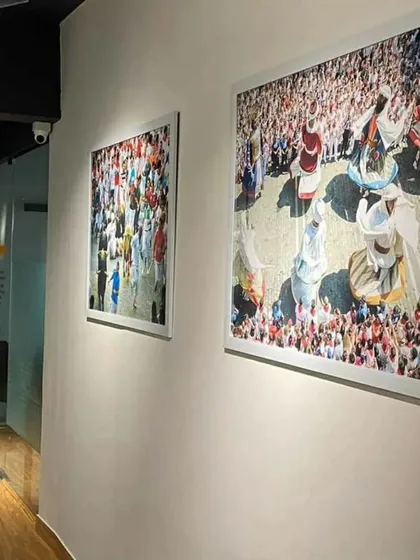 We used colorful and engaging artwork to add personality to the common areas of this co-working space. The large, framed prints create visual interest along the corridors and break up the monotony of the white walls.