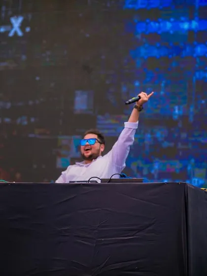 Commanding the stage at a huge outdoor festival. I use my sets to take the audience on a journey through different sounds and genres.