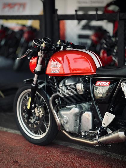 A beautifully captured shot of a race-prepped Royal Enfield GT 650 in the pits, ready for action.