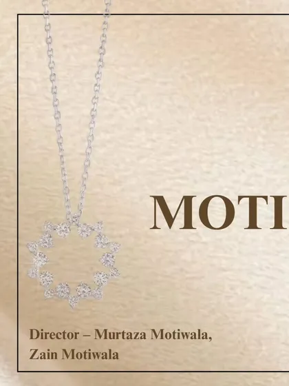 A delicate diamond pendant in a circular starburst design, presented alongside the names of our directors, symbolizing the vision behind our craft.