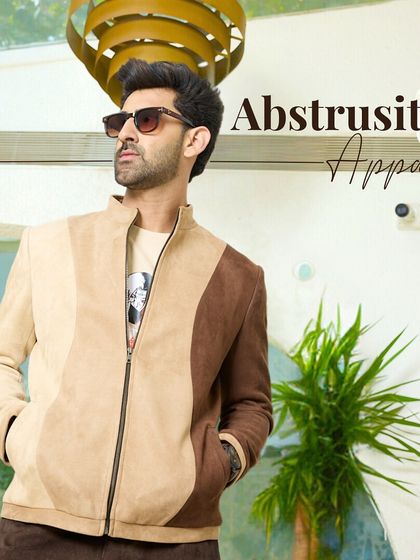 Abstrusity Apparel. This graphic overlay captures the enigmatic and confident style of the two-toned suede jacket, a versatile piece for the modern man.
