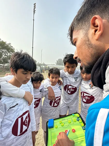 It's not just about running hard; it's about playing smart. Here, one of our AIFF licensed coaches breaks down game tactics and formations for the U13 elite team. We build football IQ from day one.