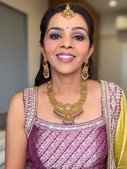 A closer view of this elegant guest makeup. You can see how the soft smokey eye defines her features without being overpowering, paired with a radiant skin finish perfect for mature skin.
