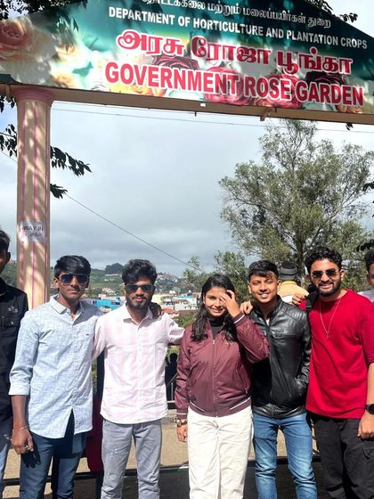 The group posing at the entrance of the Government Rose Garden in Ooty, one of the many beautiful sights we visit.