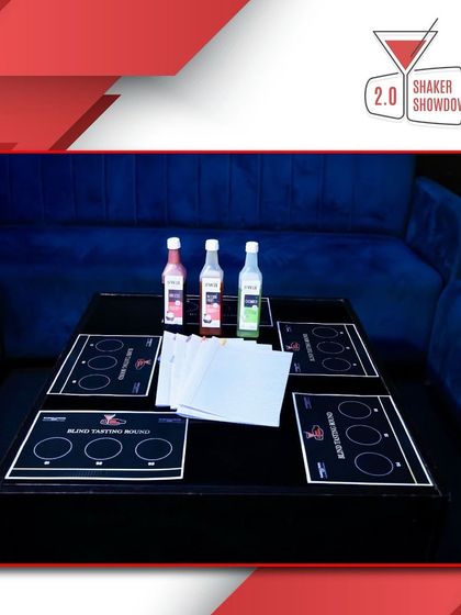 The setup for the blind tasting round of the competition. This tests the palate and sensory skills of the competitors, a crucial aspect of being a top mixologist.