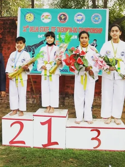 The victory podium at the 32nd Delhi State ITF Taekwon-do Championship. Seeing my students stand here, medals in hand, is what our academy is all about. Believe, achieve, succeed.