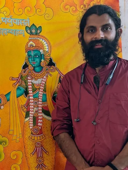 Standing with my finished 'Parthasarathi' painting. I feel that everything I create is a gift from the divine.