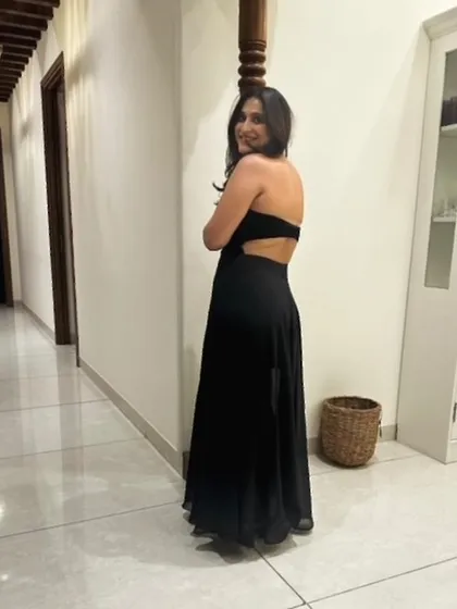 Our client Sanjana looking effortlessly chic in a custom black velvet and chiffon strapless dress with a back cutout.