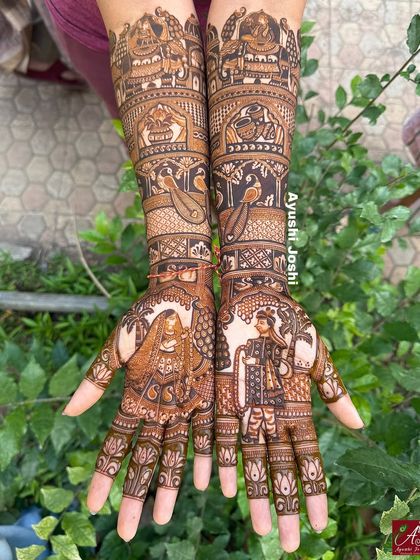 The royal bride and groom design captured outdoors, with natural light highlighting the fine details of the artwork.