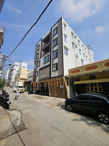 The finished exterior of our mixed-use building project in Srirampura. The design balances residential and commercial needs with a smart, contemporary facade that enhances the streetscape.