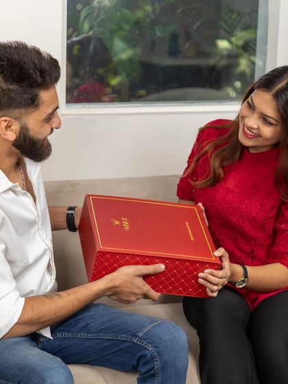 A happy customer receiving our "Wishit Signature Edit" box. Seeing the joy on someone's face when they receive one of my creations is the best part of what I do.