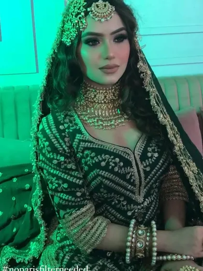 The same green outfit under different lighting, showing its versatility.