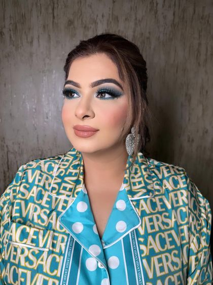 A bold and fun look with a pop of color. I created a dramatic blue smoky eye, balanced with a nude lip, for a client who loves to experiment with makeup.