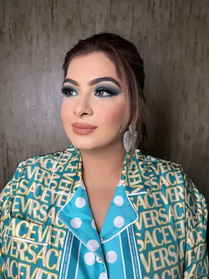 A bold and fun look with a pop of color. I created a dramatic blue smoky eye, balanced with a nude lip, for a client who loves to experiment with makeup.