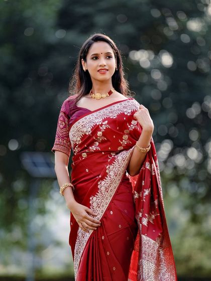 Another shot from the same series, showing the intricate details of the saree's border and blouse.