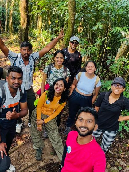 All smiles while trekking through the forest section of Kumara Parvatha. Our guides make sure the trek is not just safe but also fun.