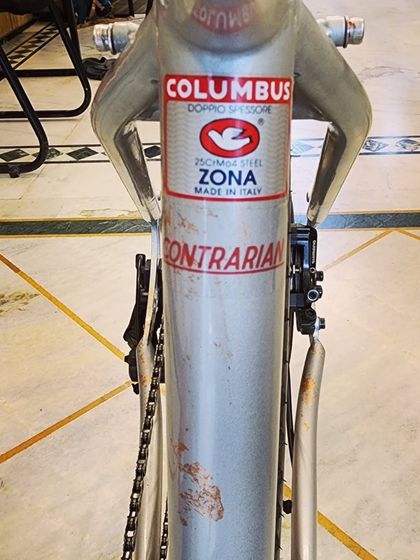 This detail shot shows the Columbus Zona tubing sticker on the 'Contrarian' frame. Using high-quality steel like this ensures a bike that is not only strong and durable but also has a lively and comfortable ride feel.