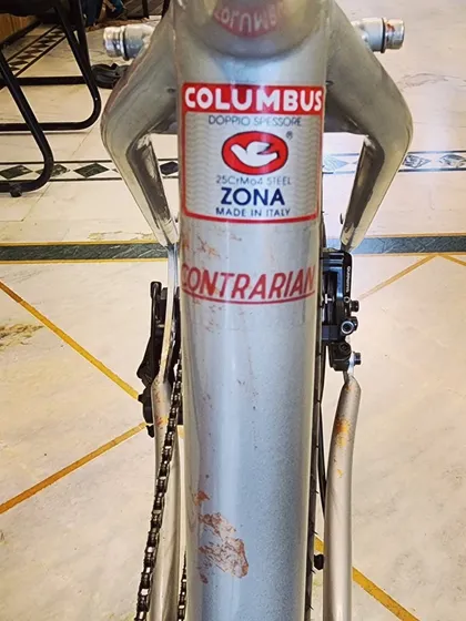 This detail shot shows the Columbus Zona tubing sticker on the 'Contrarian' frame. Using high-quality steel like this ensures a bike that is not only strong and durable but also has a lively and comfortable ride feel.