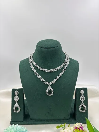 The double-strand AD necklace with a black pendant.