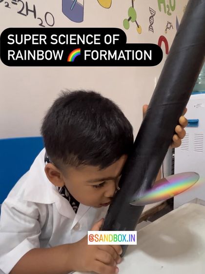 Here's a young explorer discovering the science of a rainbow. Using a simple spectroscope made from a tube and a CD, he's learning how white light is actually made up of many different colors.