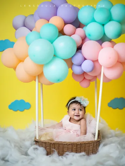 A big, happy smile from our little passenger. The joy on her face makes this hot air balloon adventure even more magical.