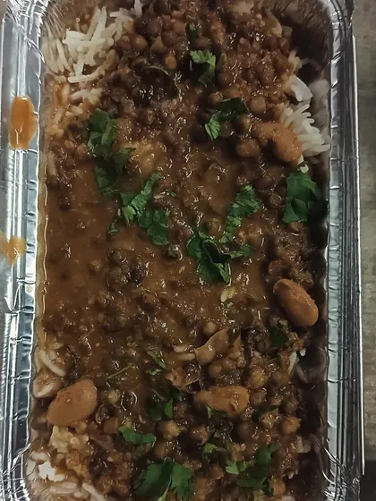 A hearty serving of Dal Makhni with rice. This rich and creamy combo is a meal in itself.