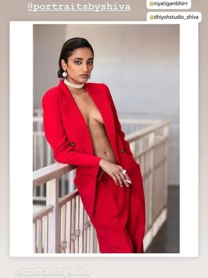 I believe every person deserves to have a portrait that makes them feel powerful and seen. This magazine-style photoshoot is designed to be a transformative experience, capturing your unique essence in a bold, artistic way. Here, the striking red suit and confident pose create a truly unforgettable image.