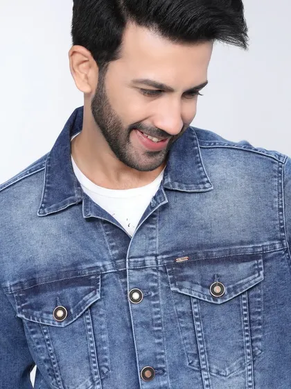A smiling model in a denim jacket, creating a friendly and approachable vibe. This type of image works well for social media and lifestyle-focused campaigns.