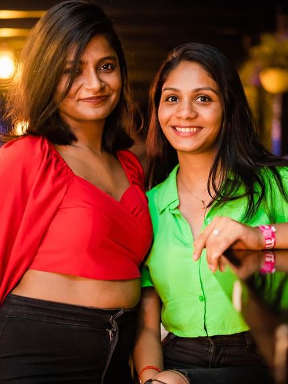 Two friends posing for a photo.