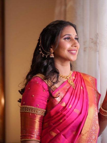 A close-up showing the details of the hairstyle and the glowing makeup, perfect for capturing these precious memories.